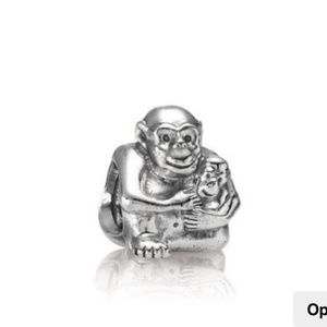 Pandora monkey holding baby retired silver charm